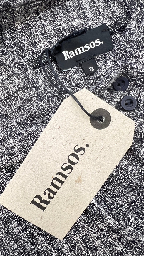 Smanicato in maglia con cartellino