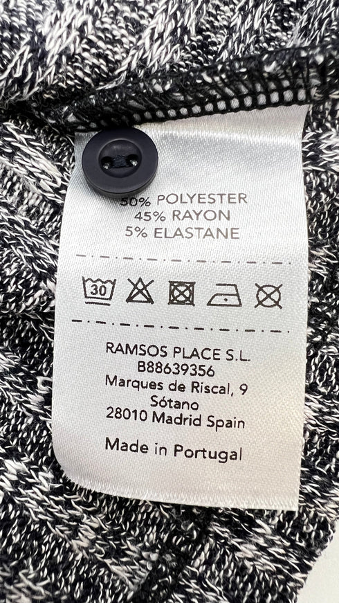 Smanicato in maglia con cartellino