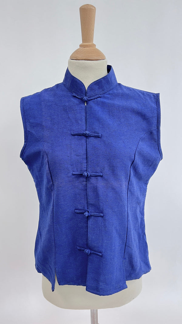 Gilet blu con alamari