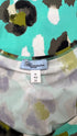 Top stampato con paillettes