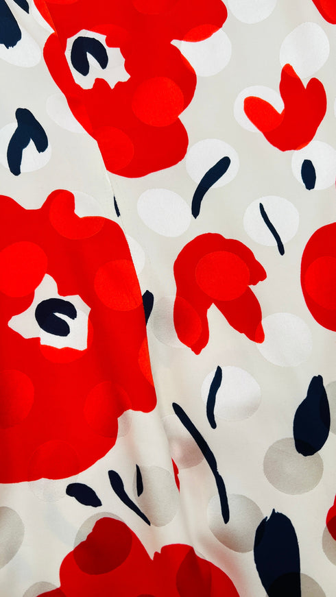 Abito corto con fiori e pois