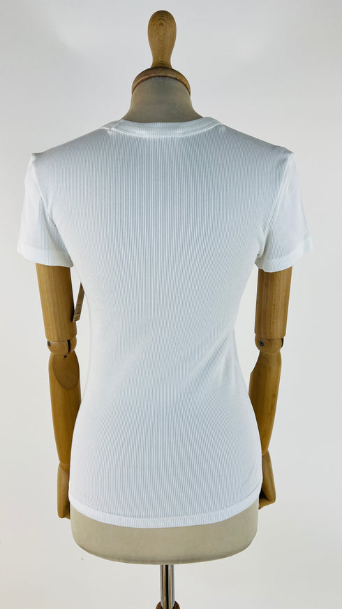 T-shirt slim fit a coste con cartellino