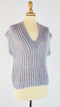 Gilet maglia e paillettes