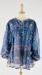 Blusa semi-trasparente