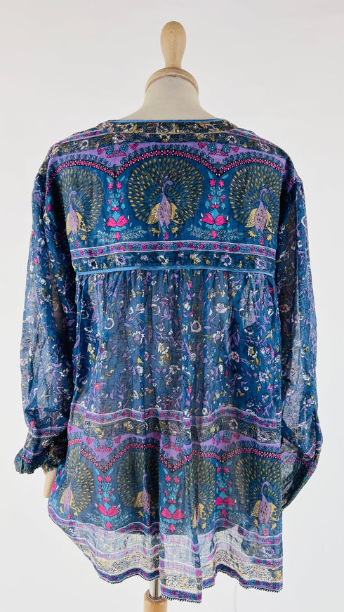 Blusa semi-trasparente