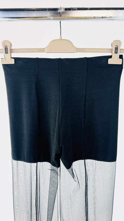 Pantaloni dritti semi trasparenti con cartellino