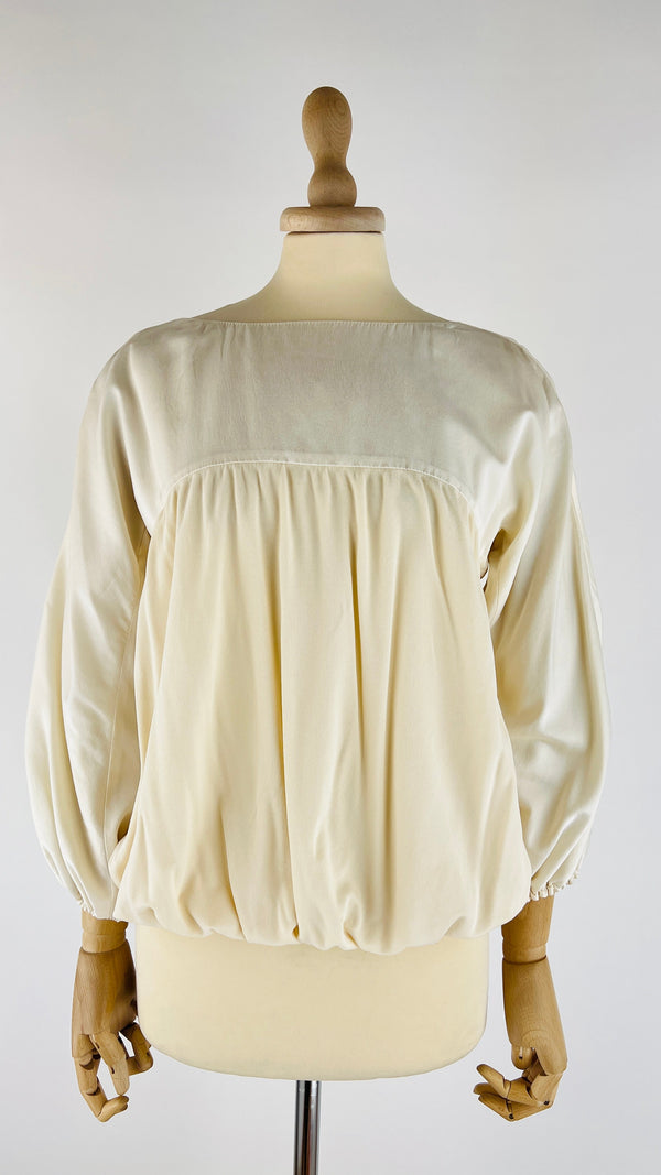 Blusa con maniche a palloncino