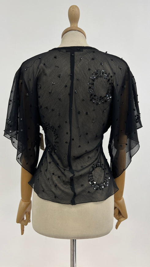 Blusa con paillettes