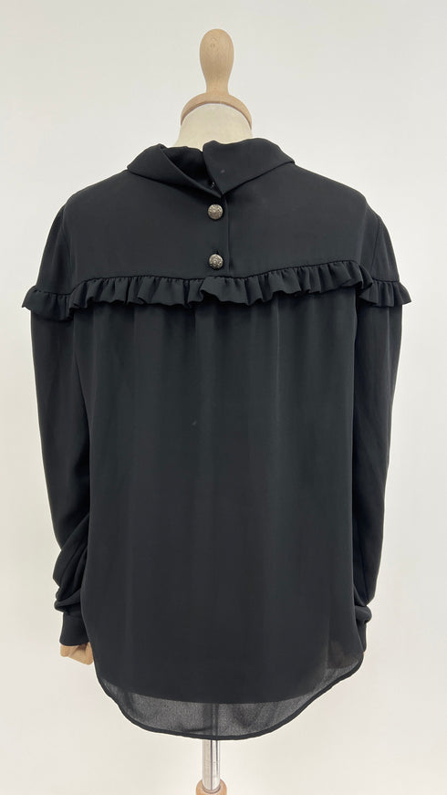 Blusa con balza