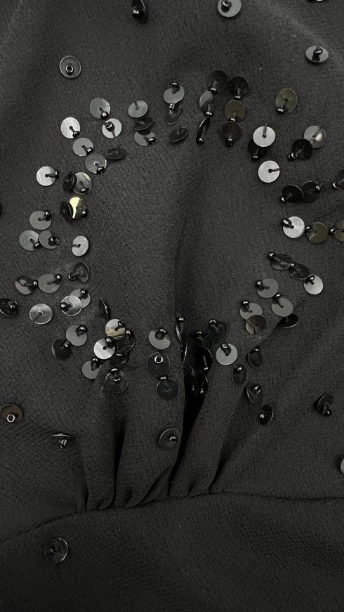 Blusa con paillettes