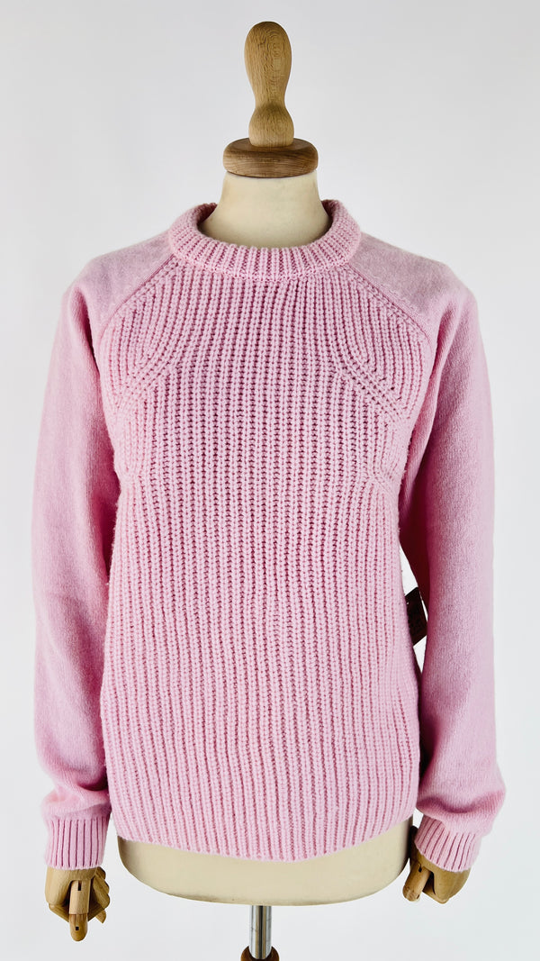 Maglione rosa dettaglio intrecciato