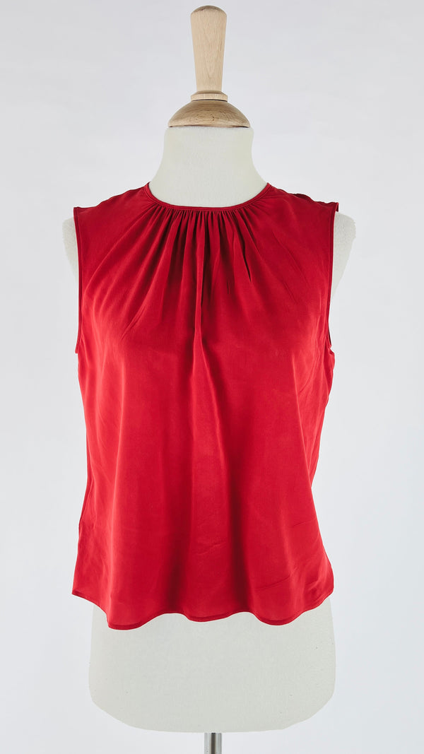Top smanicato con pences