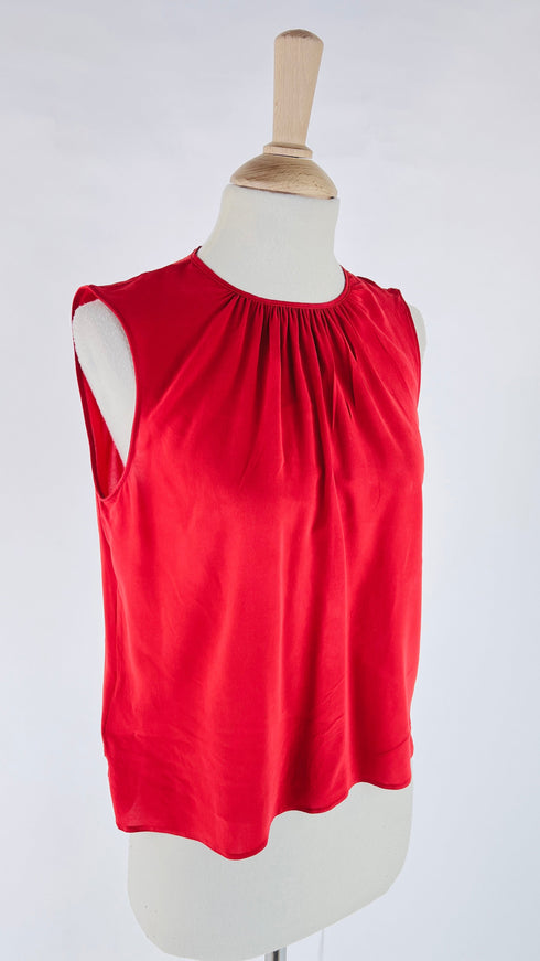 Top smanicato con pences
