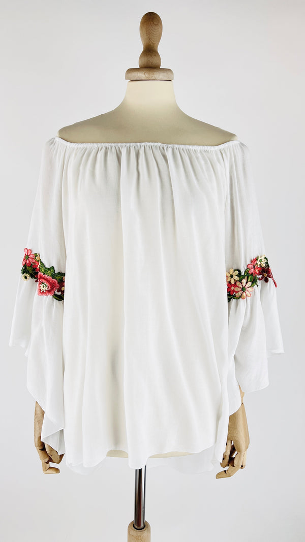 Blusa off shoulder ricamata