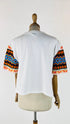 T-shirt crop con maniche in maglia