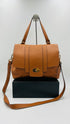 Borsa in pelle martellata