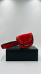 Marsupio in vernice rosso