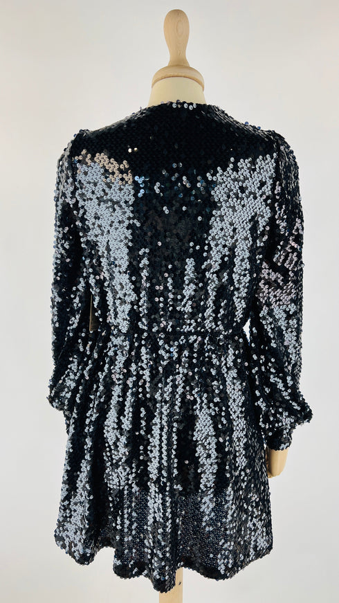 Miniabito di paillettes incrociato