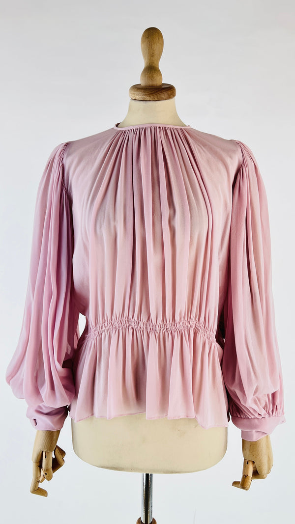 Blusa semitrasparente rosa