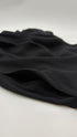 Top smanicato nero