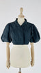 Giacca cropped in twill tech