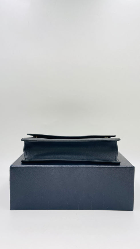 Pochette geometrica saffiano