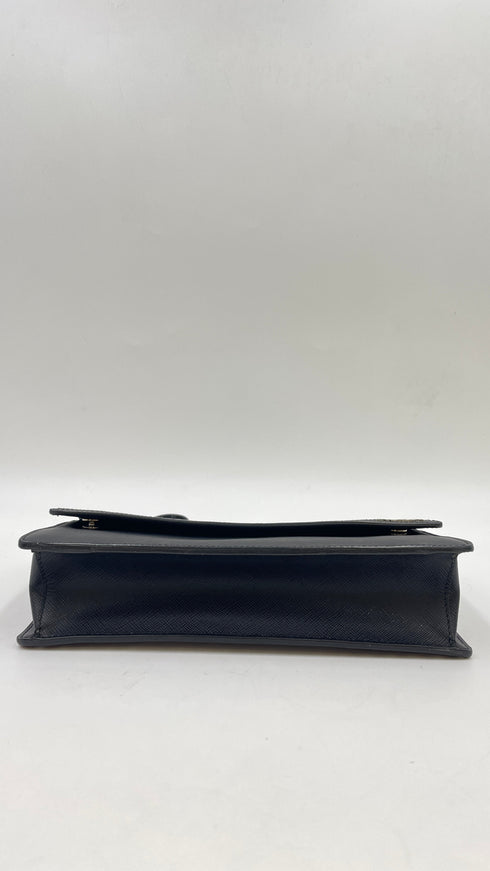 Pochette geometrica saffiano