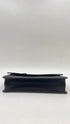 Pochette geometrica saffiano