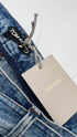 Shorts in jeans con cartellino