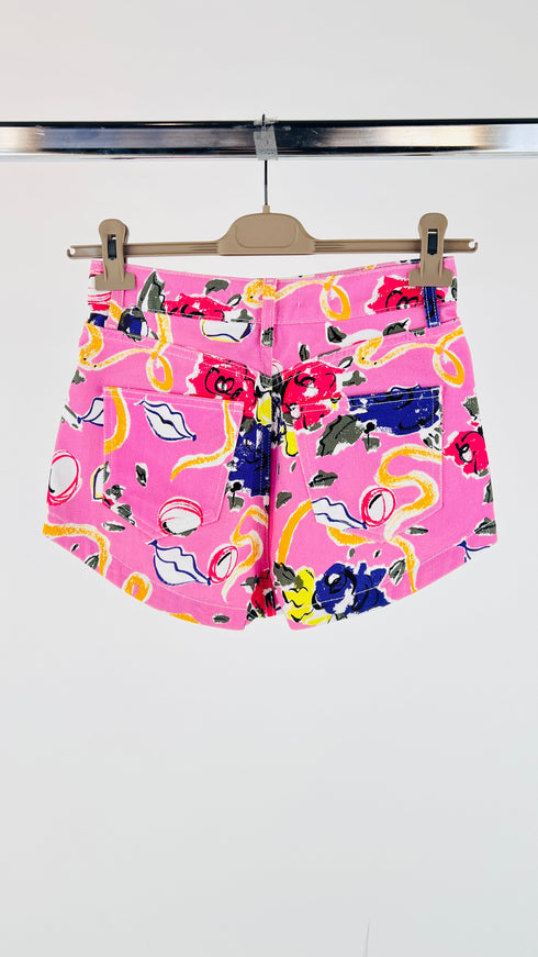 Shorts floreali bottoni decorativi