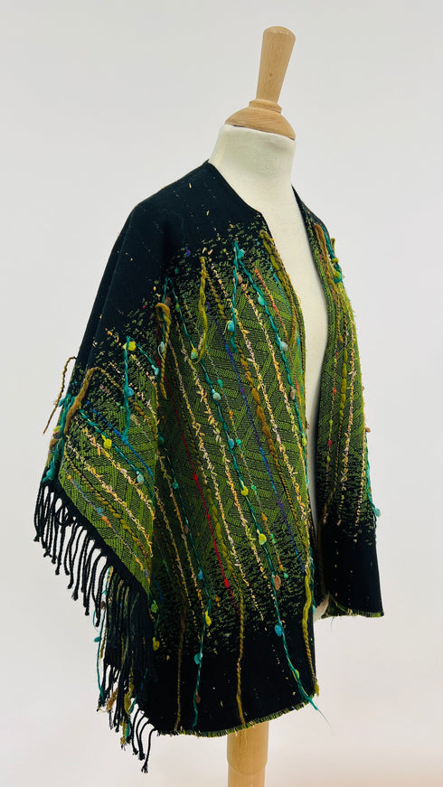 Poncho sfrangiato