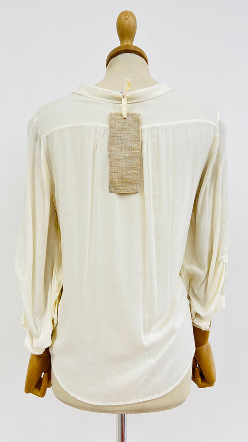 Camicia fiocco con cartellino