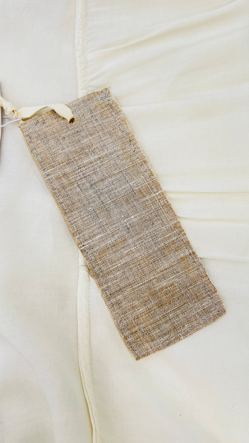 Camicia fiocco con cartellino