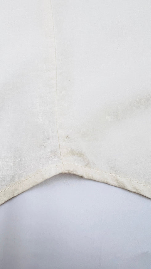 Camicia fiocco con cartellino