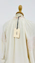 Camicia ricamata con cartellino