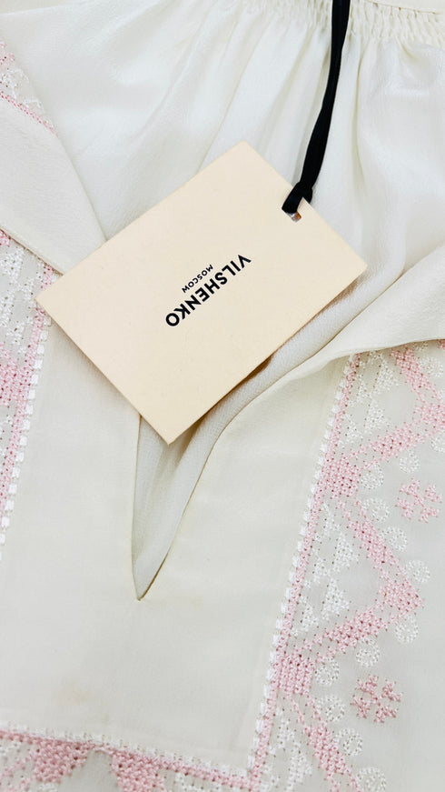 Camicia ricamata con cartellino