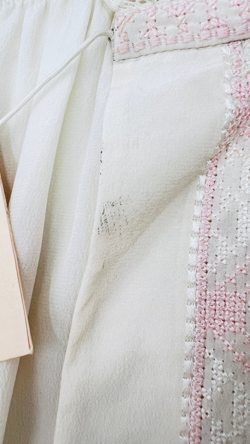 Camicia ricamata con cartellino