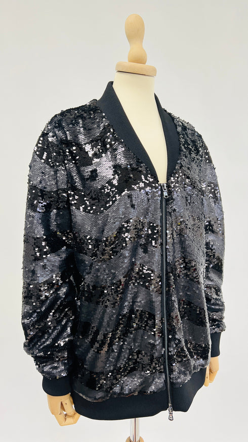 Bomber nero di paillettes con cartellino
