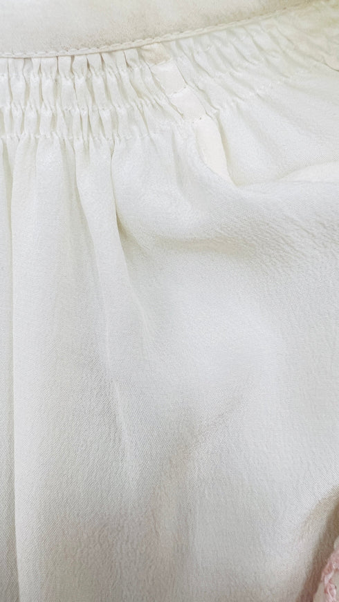 Camicia ricamata con cartellino