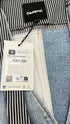 Gilet patchwork con cartellino