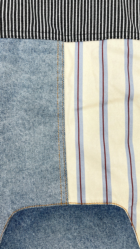 Gilet patchwork con cartellino