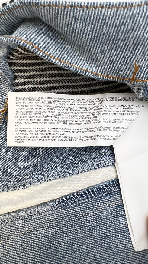 Gilet patchwork con cartellino