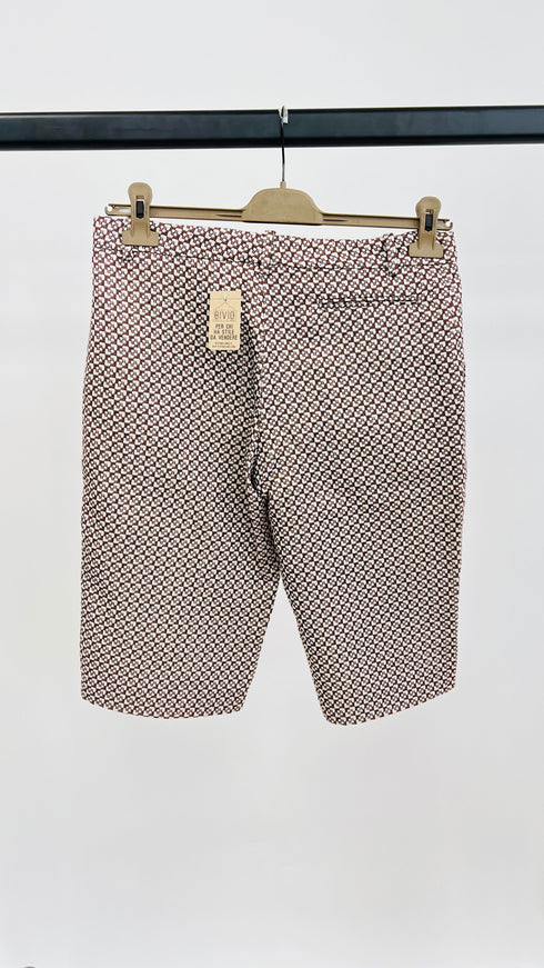 Shorts motivo geometrico