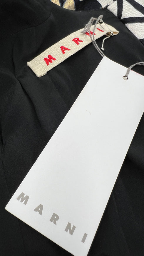 Maglia fantasia con cartellino