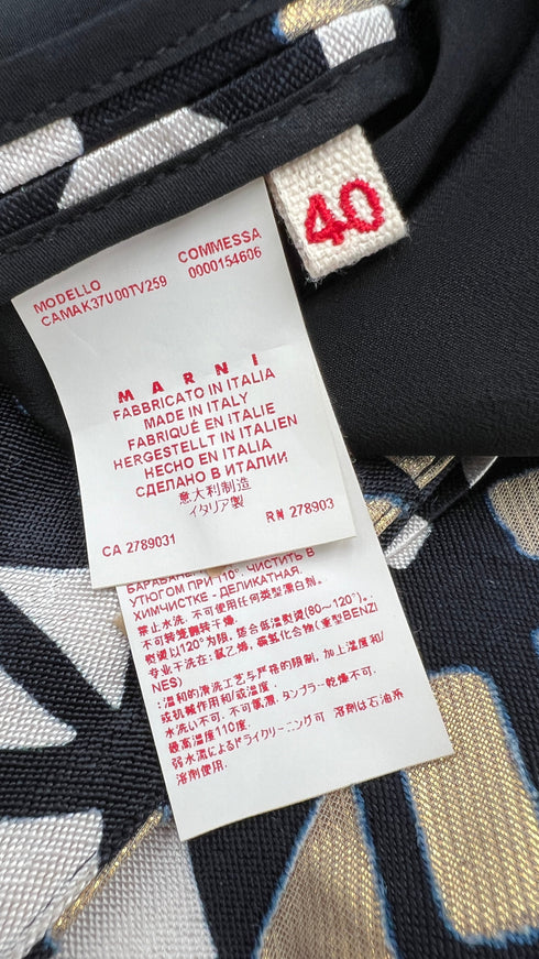 Maglia fantasia con cartellino