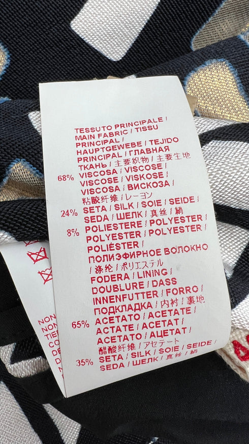 Maglia fantasia con cartellino