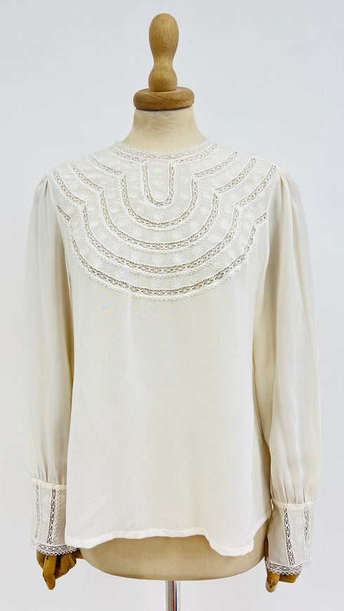 Blusa collo ricamo