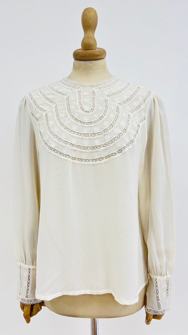 Blusa collo ricamo