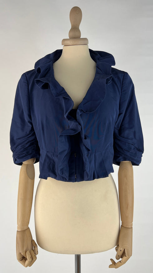 Bolero blu con cartellino