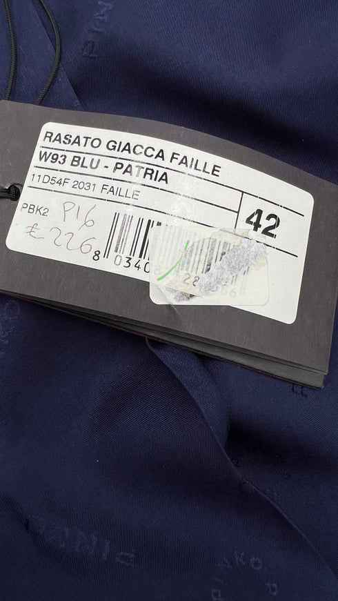 Bolero blu con cartellino